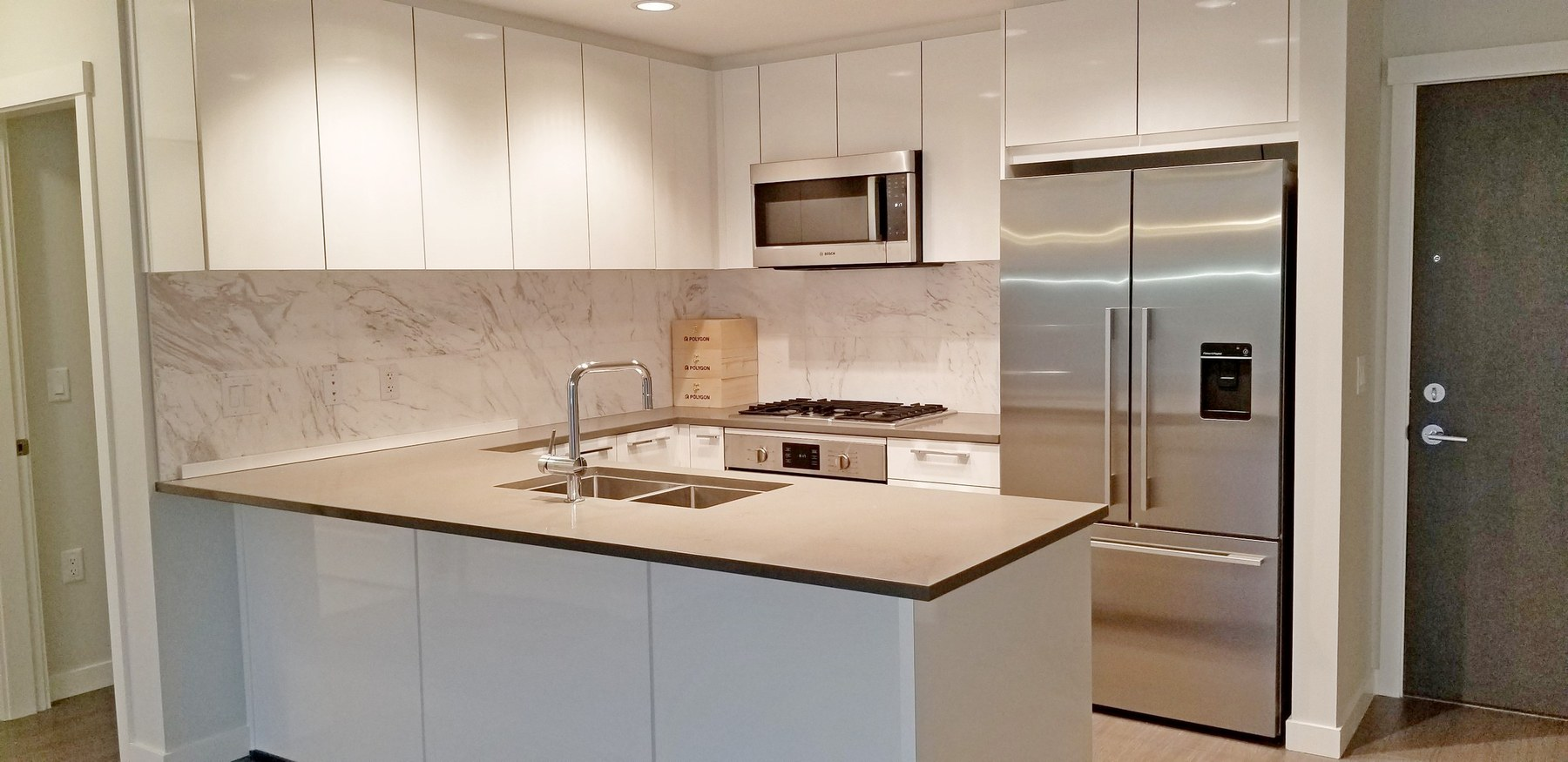 Kitchen interior at 202–3263 Pierview Crescent, Vancouver