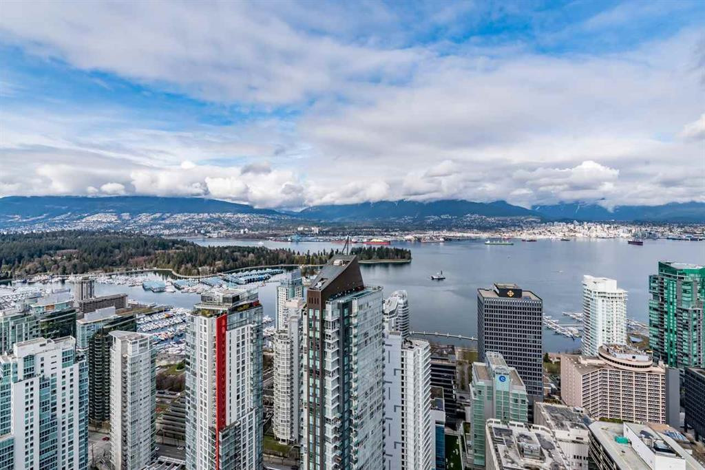 Original listing view photographed from 5306–1151 W Georgia Street, Vancouver